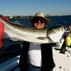 Ray DeRosa of Narragansett with a very nice striper caught on the Brenton Reef
