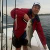 Rick Oliver with one of many school bass caught on the Brenton Reef
