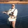 Bob Rabiner of Tiverton  with a November Striper caught in the Narrow River
