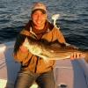 Bob Voltaggio of New York with an early morning striper off of Rough Point
