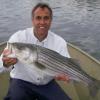 Brian Long of Orvis fishing the worm hatch in Potter Pond


