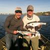 Bob Voltaggio and Jamie Levitt of New York, with a pair of sweet school bass fishing very skinny water in Stonington, CT

