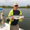 Dr. Joseph Dillard of Billings, MT with one of many stripers he caught during the worm hatch. 

