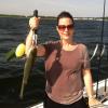 Julie Derene caught several great stripers in a huge topwater school on one of the windiest and wettest days on Narragansett Bay of 2013
