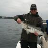 Colin Glazer of Toronto with one of many stripers he caught on the fly on Price's Neck
