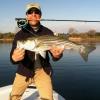 Jason LaButti with a nice bass caught in April during an early emergence of cinder worms
